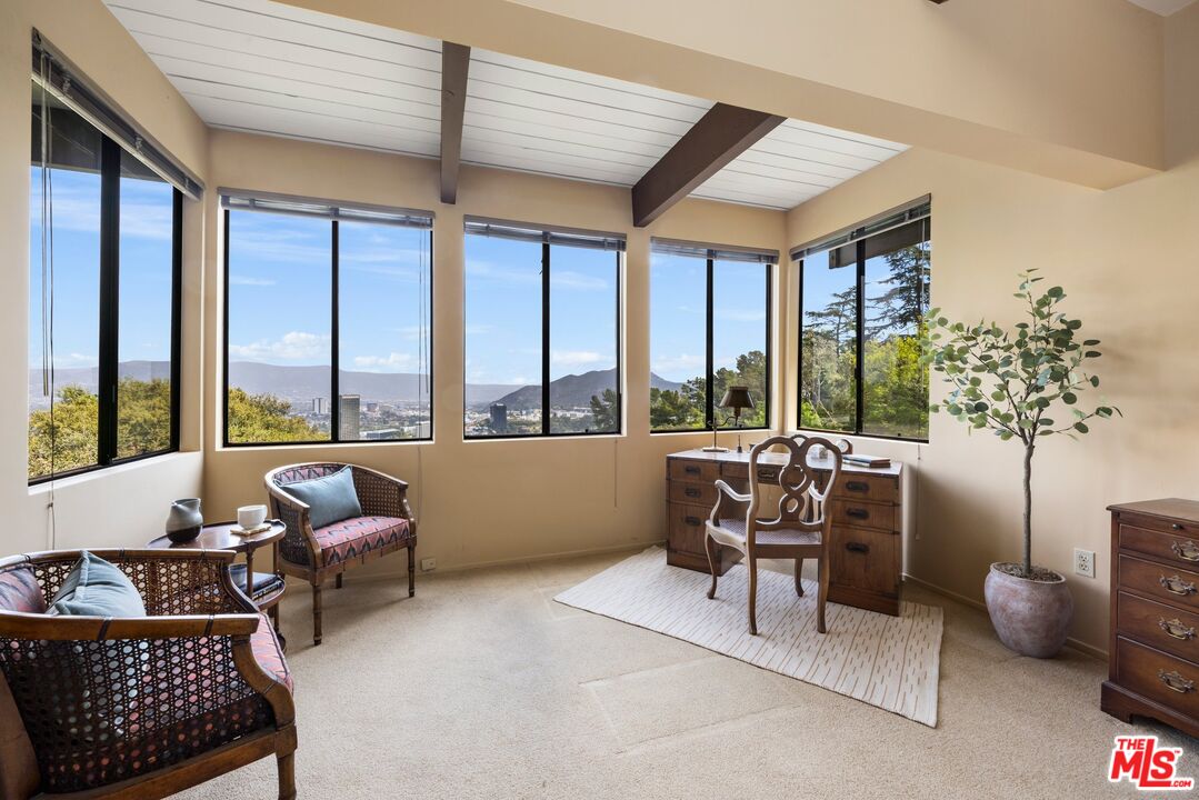 3230 Wrightwood Drive Studio City, CA 91604 - Photo 20 of 43 a living room with furniture and floor to ceiling windows
