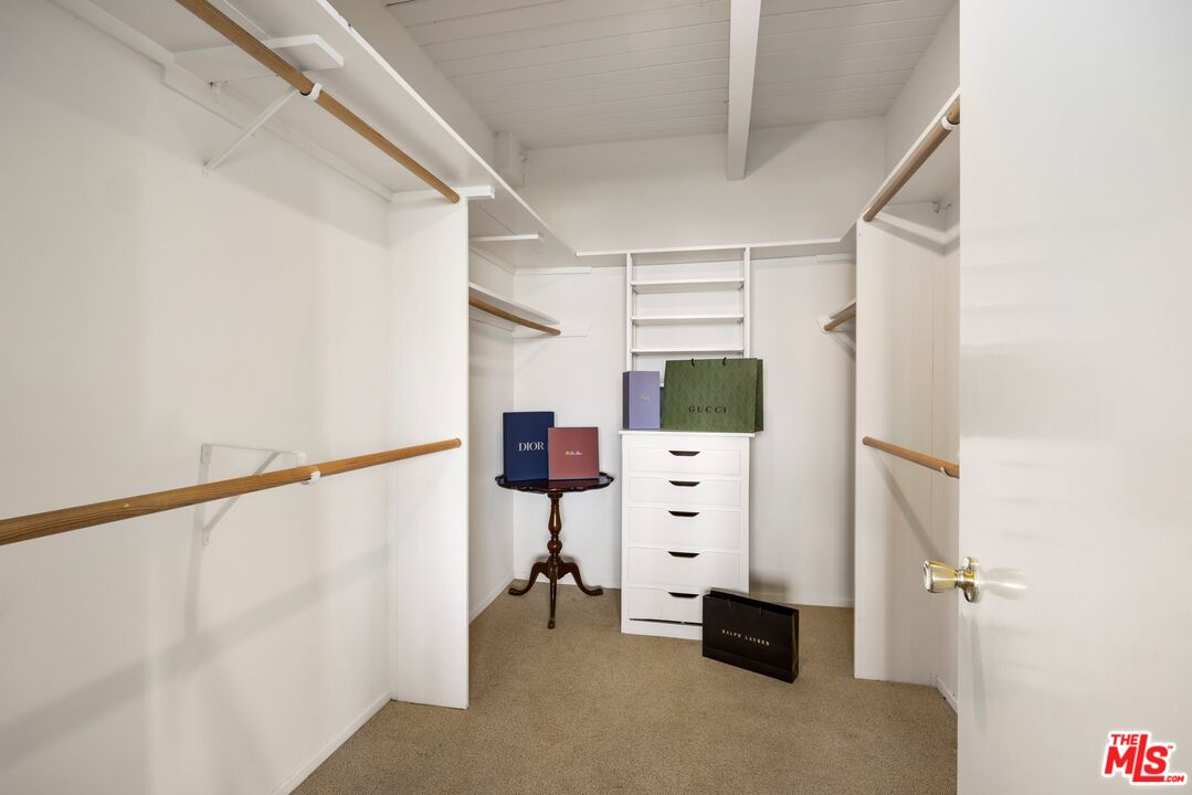 3230 Wrightwood Drive Studio City, CA 91604 - Photo 21 of 43 a view of walk in closet with clothes and shoes