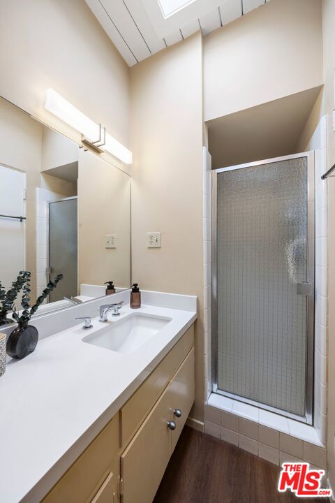 3230 Wrightwood Drive Studio City, CA 91604 - Photo 30 of 43 a bathroom with a sink and a mirror