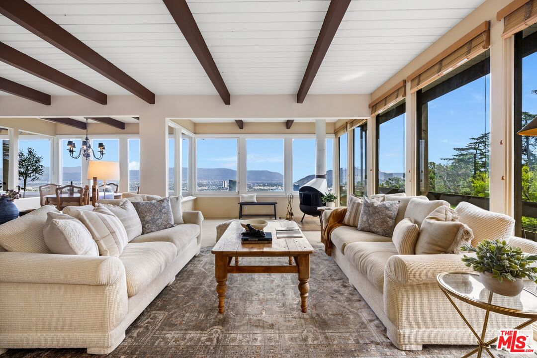 3230 Wrightwood Drive Studio City, CA 91604 - Photo 3 of 43 a living room with furniture and a large window