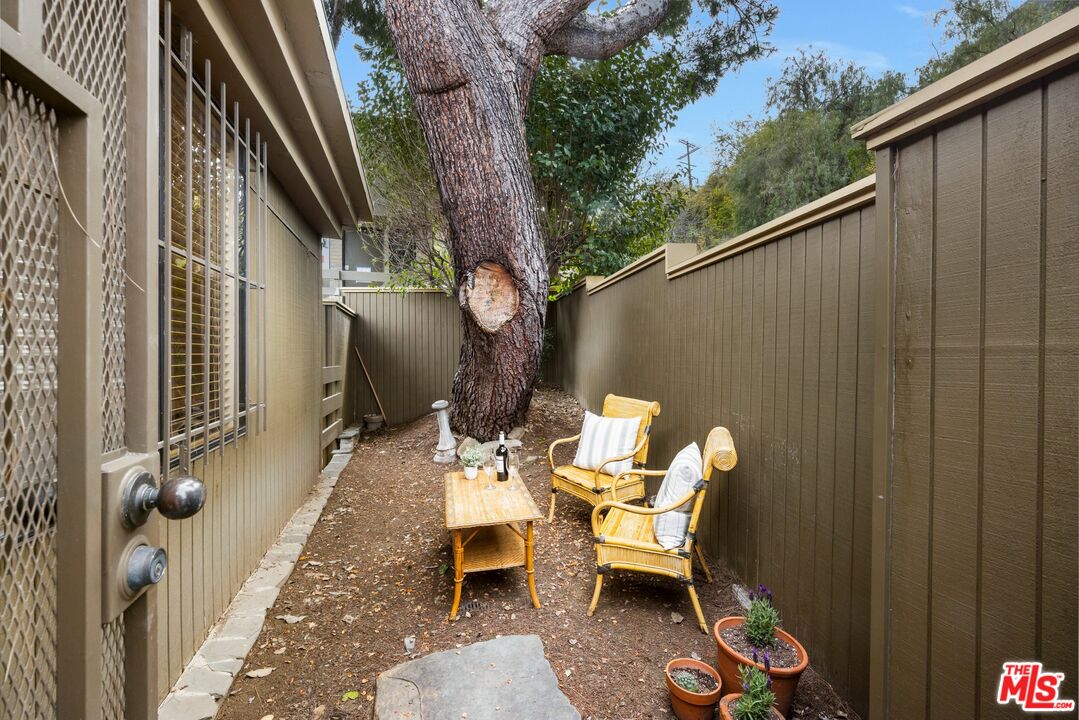 3230 Wrightwood Drive Studio City, CA 91604 - Photo 32 of 43 a couple of table and chairs in patio of the house