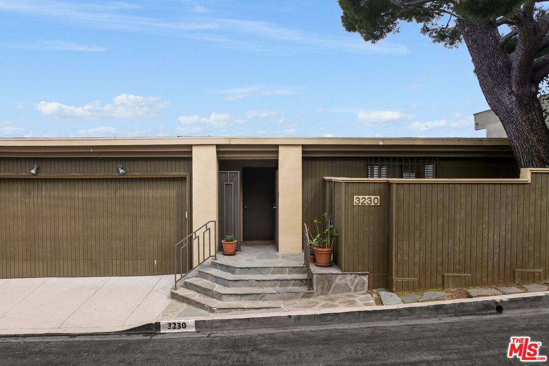 3230 Wrightwood Drive Studio City, CA 91604 - Photo 34 of 43 a view of house with a outdoor space