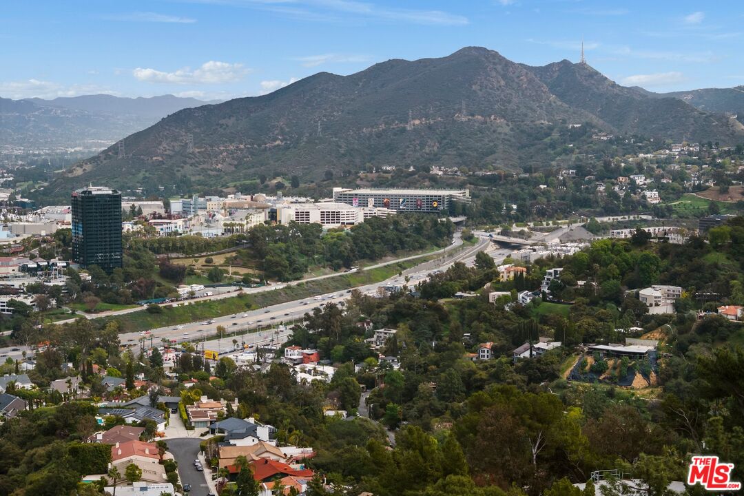 3230 Wrightwood Drive Studio City, CA 91604 - Photo 40 of 43 a view of a town with mountains in the background