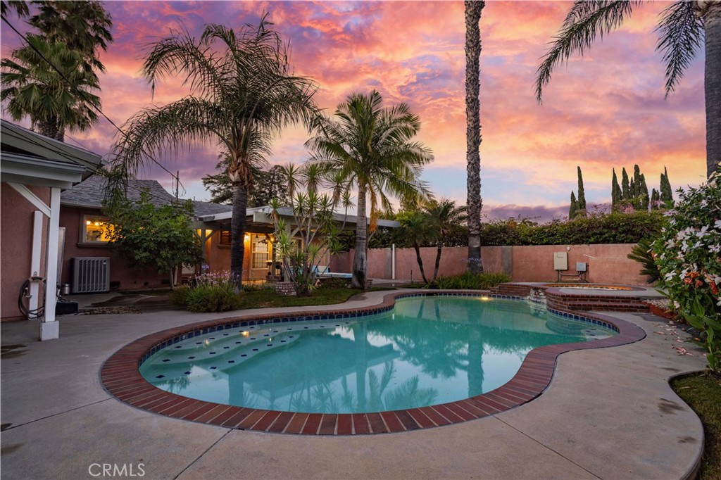 18308 Lahey Street Porter Ranch, CA 91326 - Photo 29 of 41 a view of a swimming pool with a patio