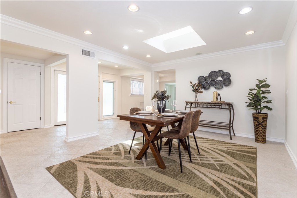 18308 Lahey Street Porter Ranch, CA 91326 - Photo 6 of 41 a view of a dining room with furniture