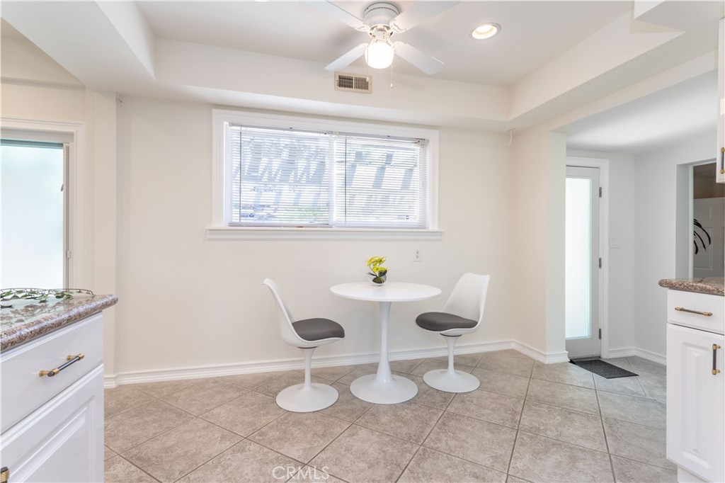 18308 Lahey Street Porter Ranch, CA 91326 - Photo 10 of 41 a dining room with furniture and window