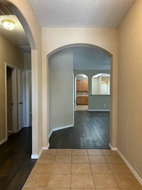 3618 Primrose Trace Lane Spring, TX 77389 - Photo 4 of 23 Tiled entry leading to the Spacious Den with New Wood Floors