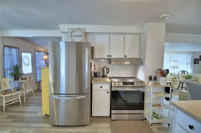 a view of a kitchen with a window