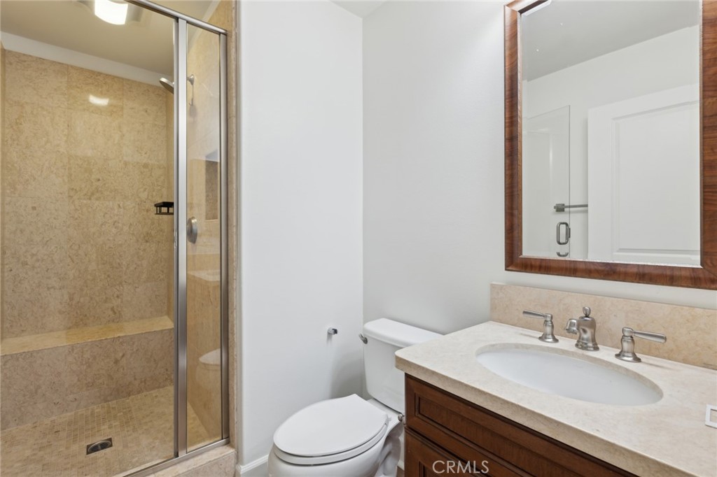 40 Lupari Irvine, CA 92618 - Photo 14 of 56 a bathroom with a sink a toilet and shower