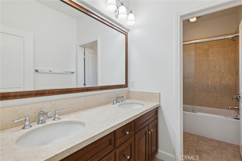 40 Lupari Irvine, CA 92618 - Photo 20 of 56 a bathroom with a sink and a mirror