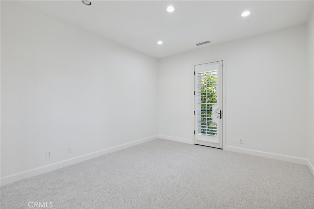 40 Lupari Irvine, CA 92618 - Photo 21 of 56 a view of an empty room with a window