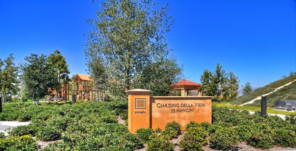 40 Lupari Irvine, CA 92618 - Photo 38 of 56 a sign that is sitting on a pole