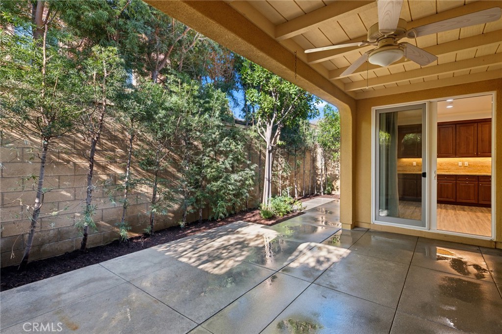 40 Lupari Irvine, CA 92618 - Photo 10 of 56 a view of a porch with wooden floor and fence