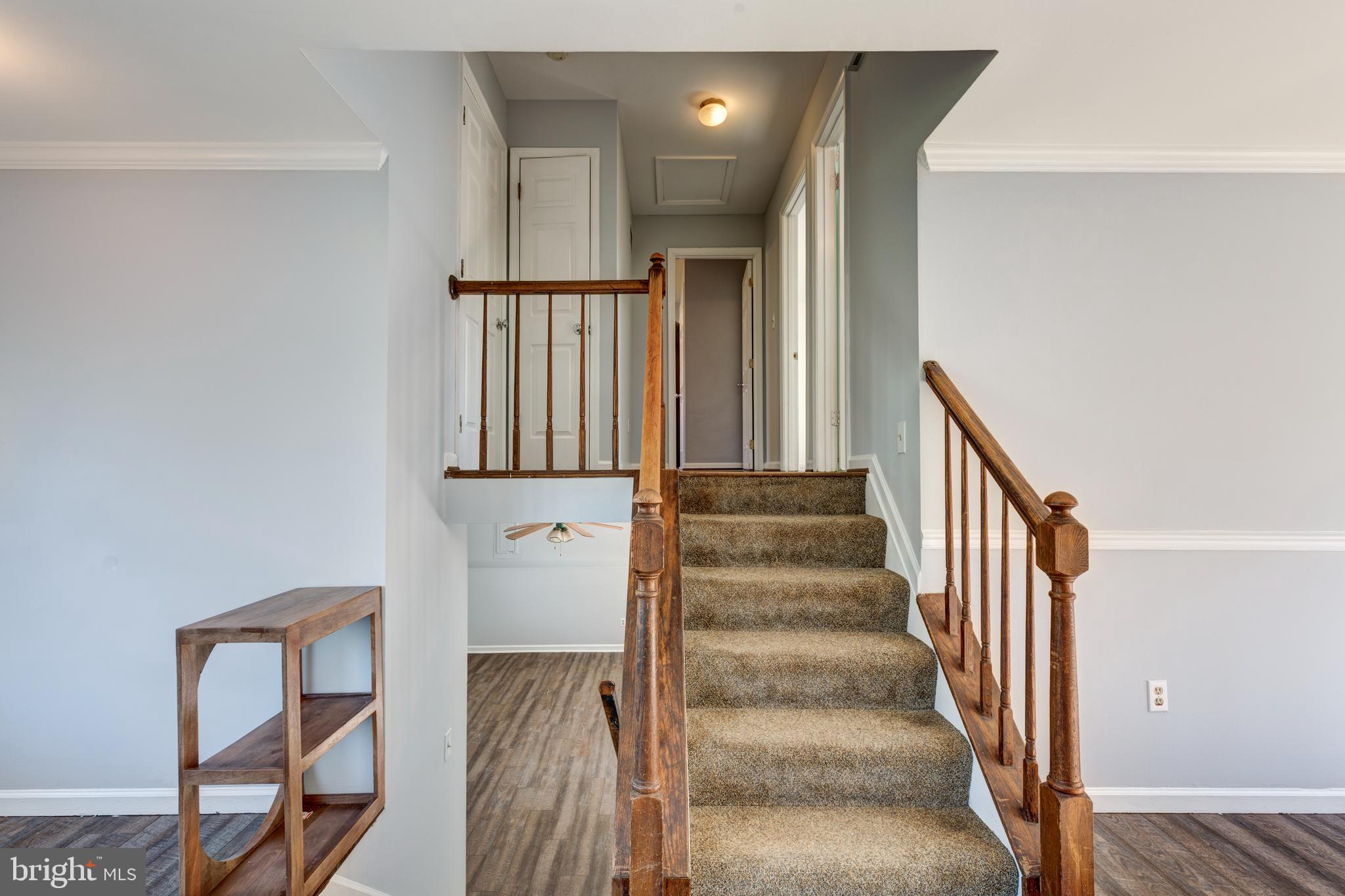 703 Uniontown Road Westminster, MD 21158 - Photo 12 of 42 a view of entryway with wooden floor and stairs