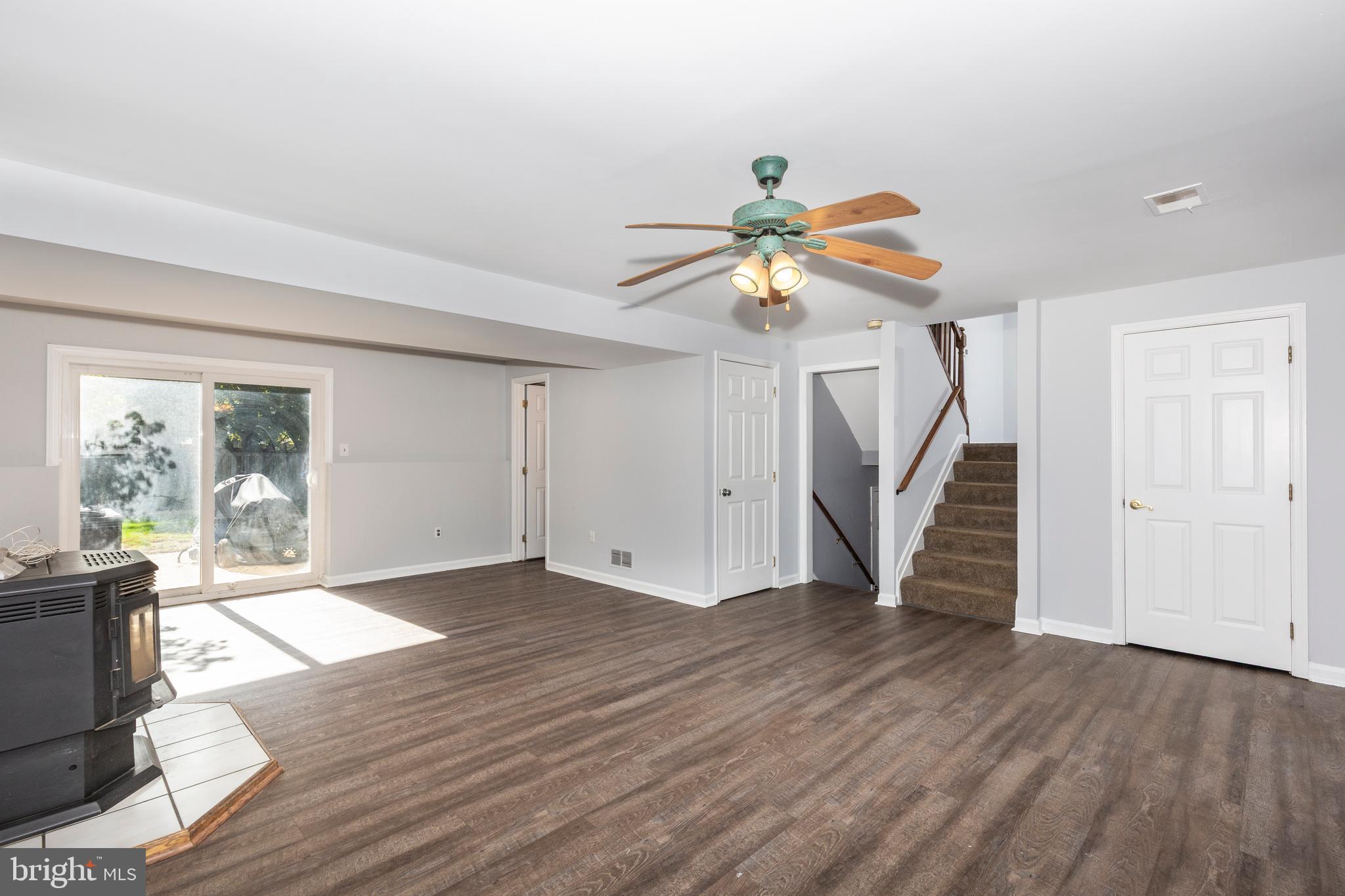 703 Uniontown Road Westminster, MD 21158 - Photo 24 of 42 wooden floor in an empty room with a window
