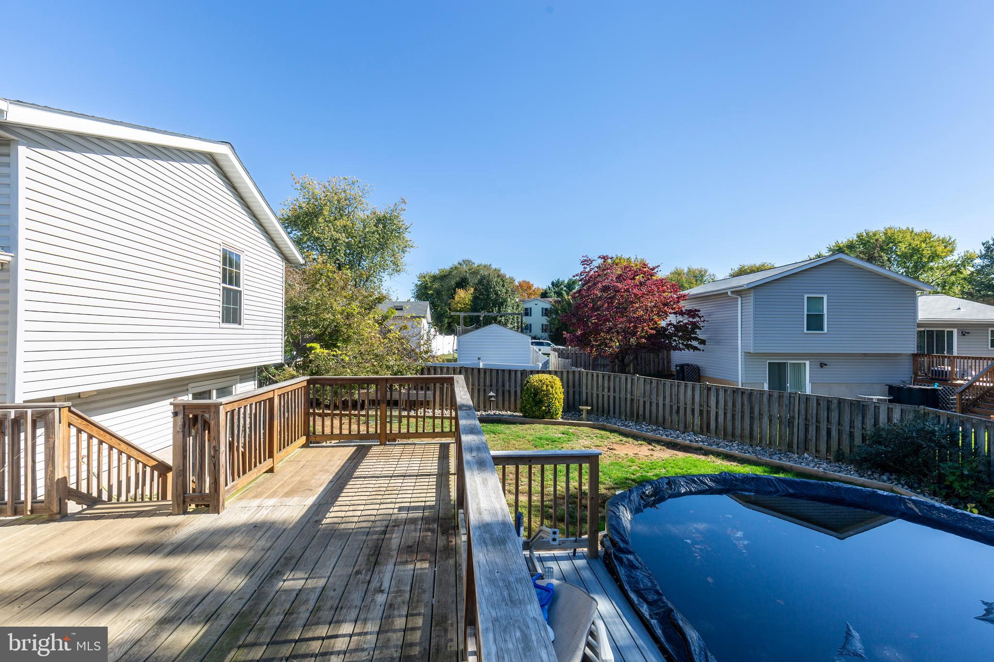 703 Uniontown Road Westminster, MD 21158 - Photo 28 of 42 a view of a chairs and table on the wooden floor