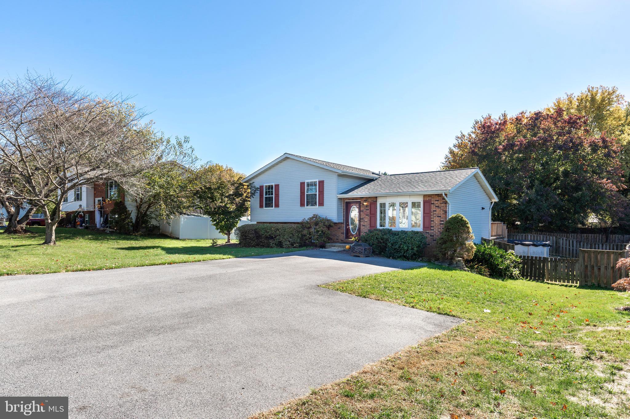 703 Uniontown Road Westminster, MD 21158 - Photo 41 of 42 a front view of house with yard and green space