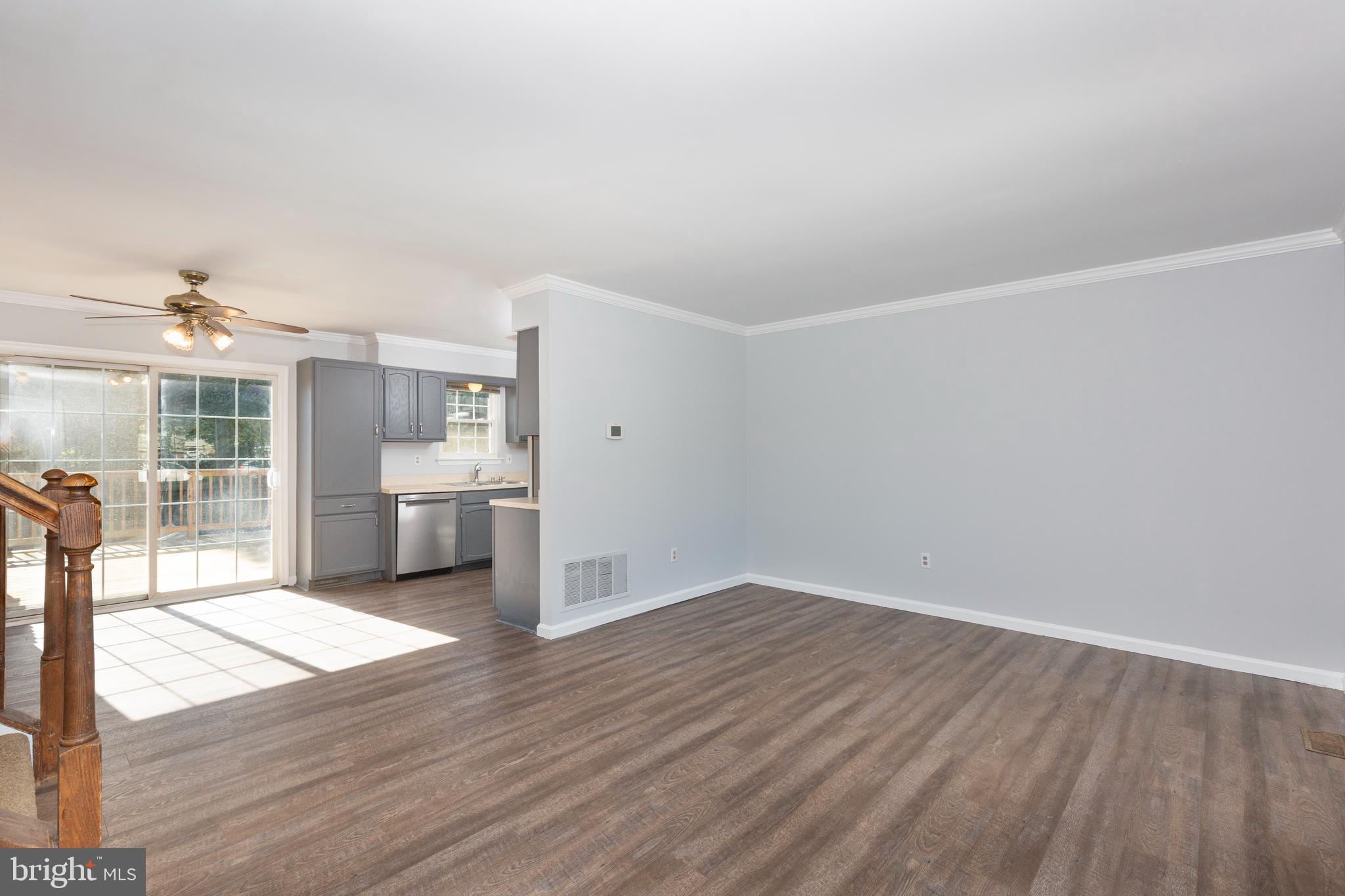 703 Uniontown Road Westminster, MD 21158 - Photo 8 of 42 a view of a kitchen with wooden floor and a kitchen space