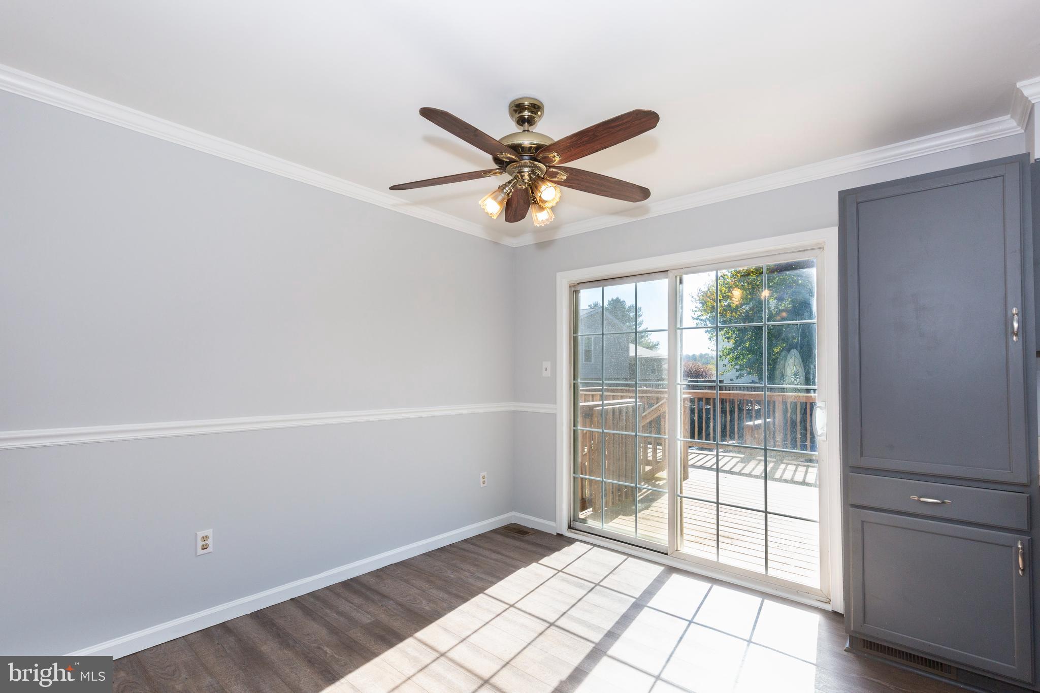 703 Uniontown Road Westminster, MD 21158 - Photo 10 of 42 a view of an empty room with a window