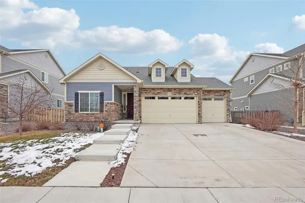 a view of a house with a street