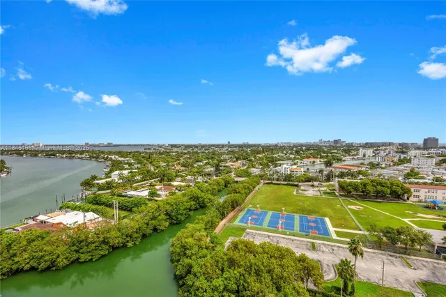 a view of a city with an ocean