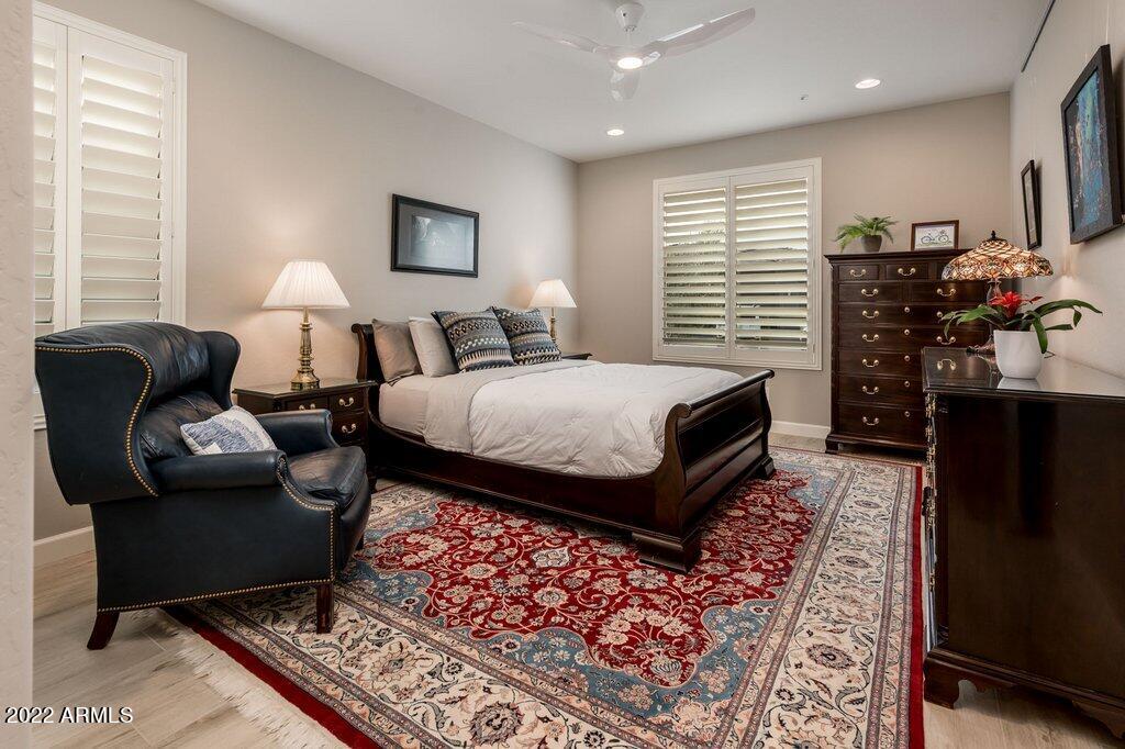 17860 East Cindercone Road Rio Verde, AZ 85263 - Photo 22 of 60 a bedroom with furniture and a rug