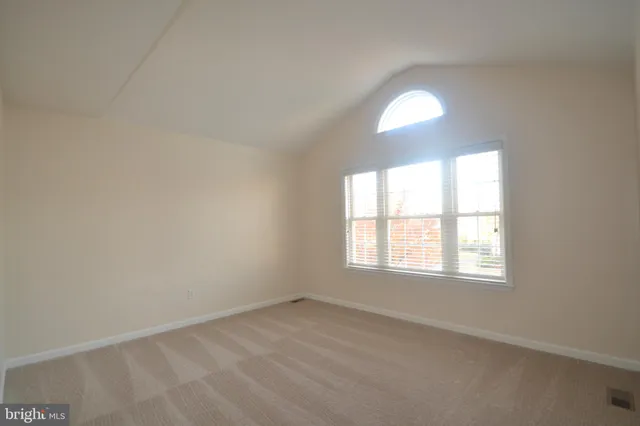 a bathroom with a sink a toilet and vanity