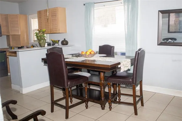 a view of a dining room and chairs