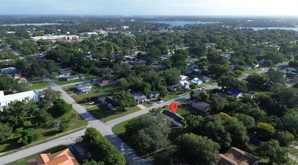 an aerial view of a town with couple of houses