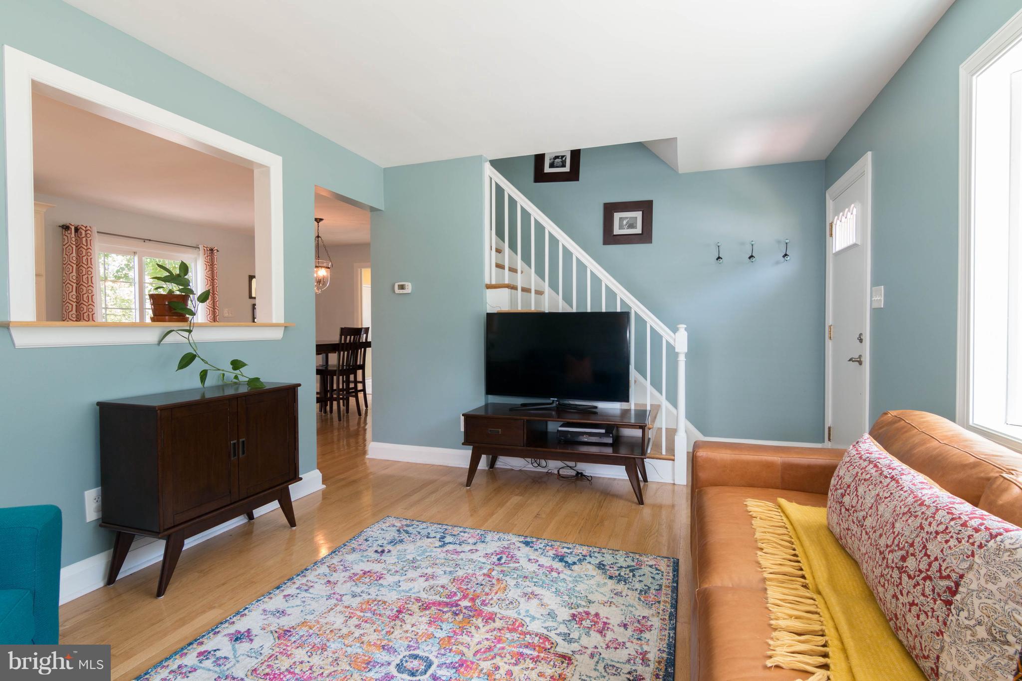 1234 Oakland Terrace Road Baltimore, MD 21227 - Photo 4 of 30 a living room with furniture and a flat screen tv