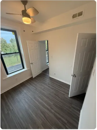 a view of entryway with wooden floor