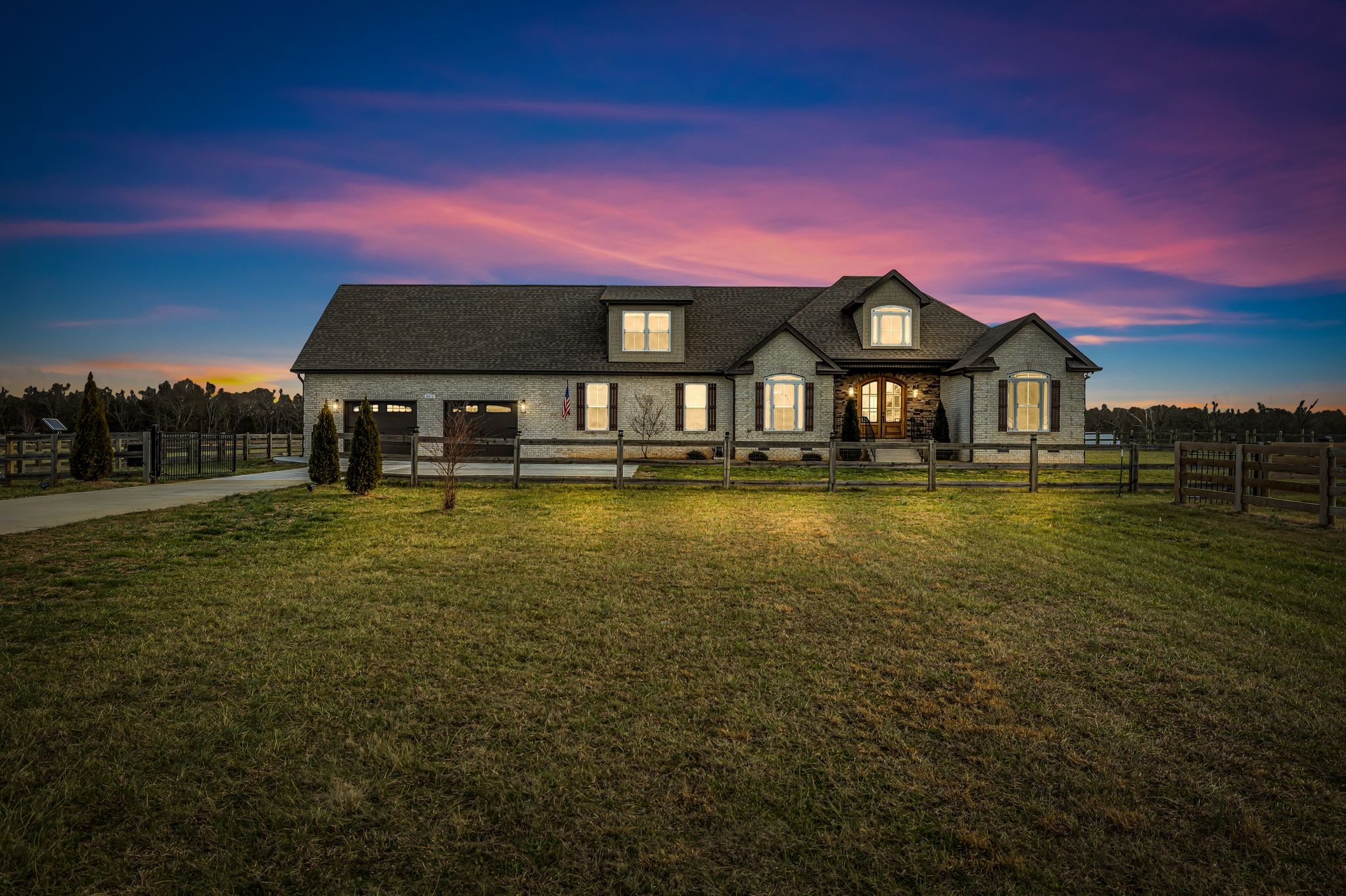 852 Longview Road Shelbyville, TN 37160 - Photo 1 of 38 a front view of a house with a lake view