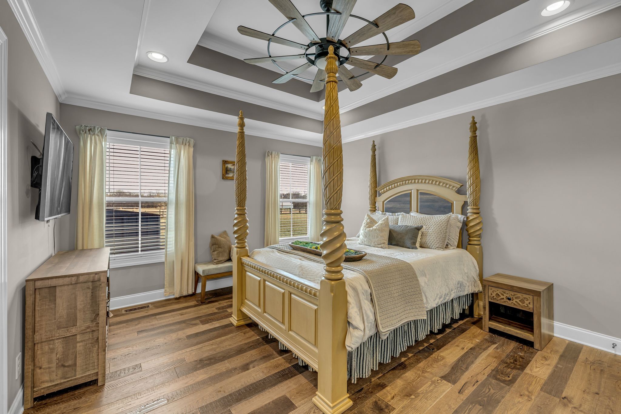 852 Longview Road Shelbyville, TN 37160 - Photo 17 of 38 a bedroom with a bed and a chandelier