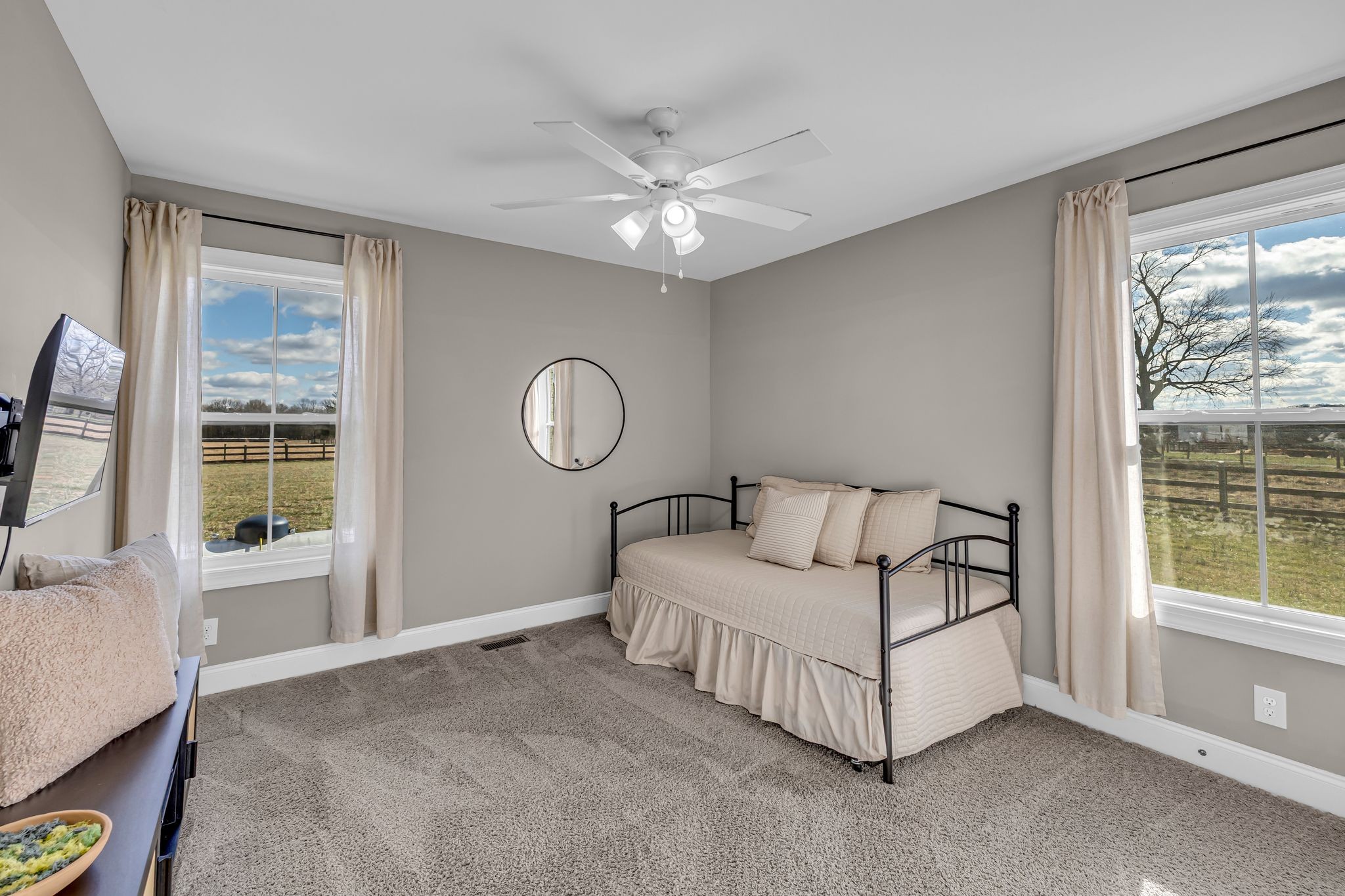 852 Longview Road Shelbyville, TN 37160 - Photo 24 of 38 a bed sitting in a spacious bedroom next to a window