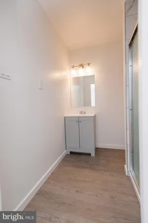 a bathroom with a toilet and a sink