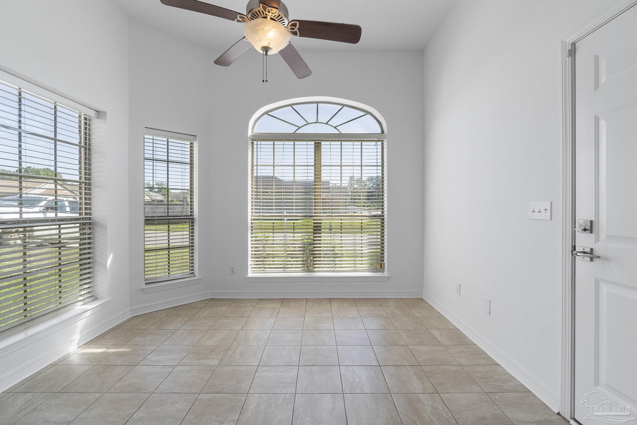 576 Edith Lane Pensacola, FL 32534 - Photo 16 of 38 a view of an empty room with a window