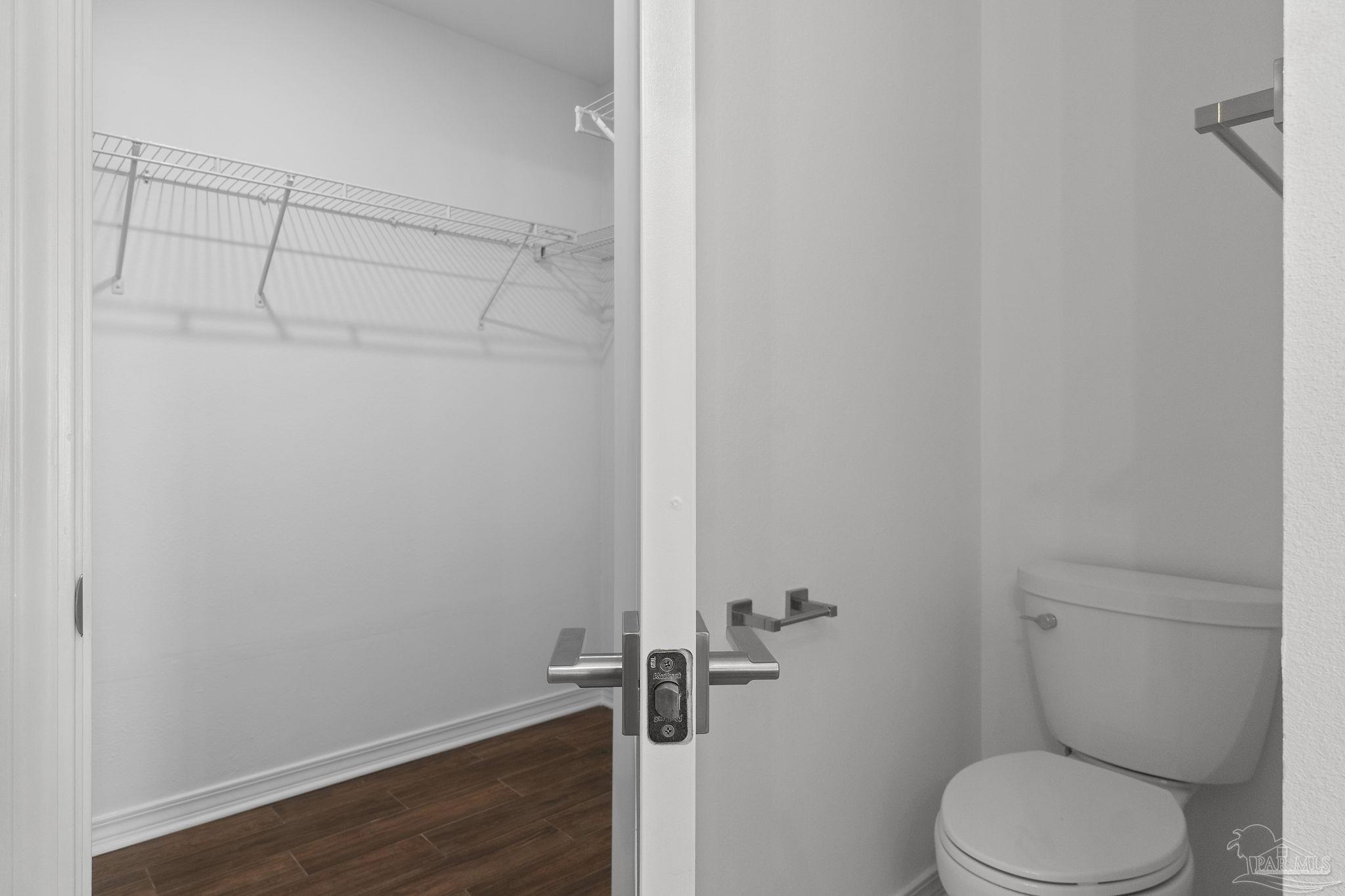 576 Edith Lane Pensacola, FL 32534 - Photo 23 of 38 a white toilet sitting next to a shower