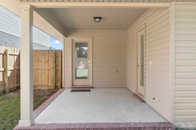 a house view with a backyard space