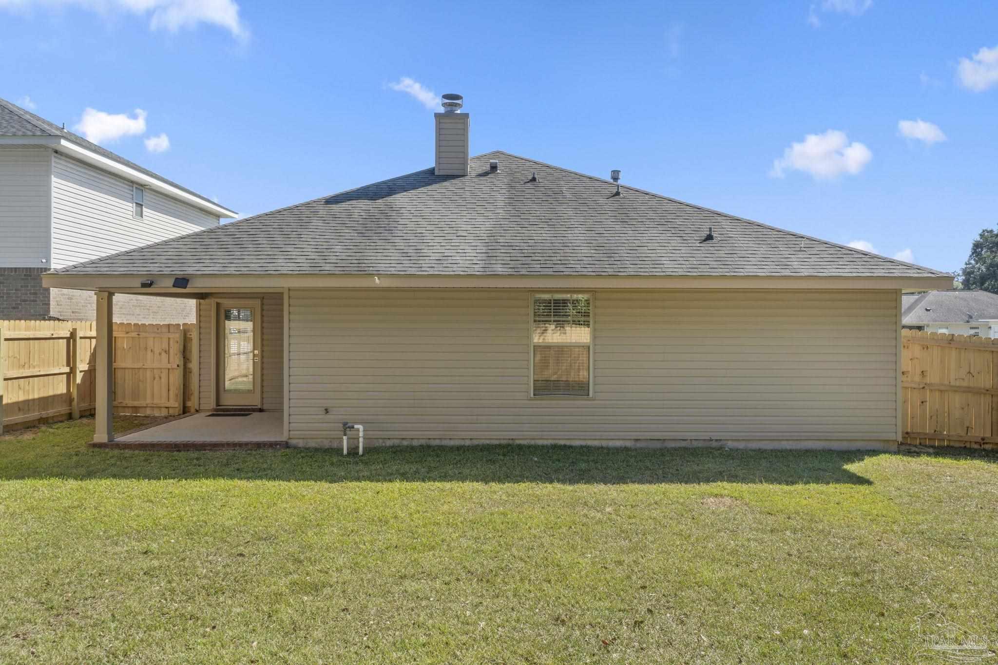 576 Edith Lane Pensacola, FL 32534 - Photo 35 of 38 a house view with a backyard space