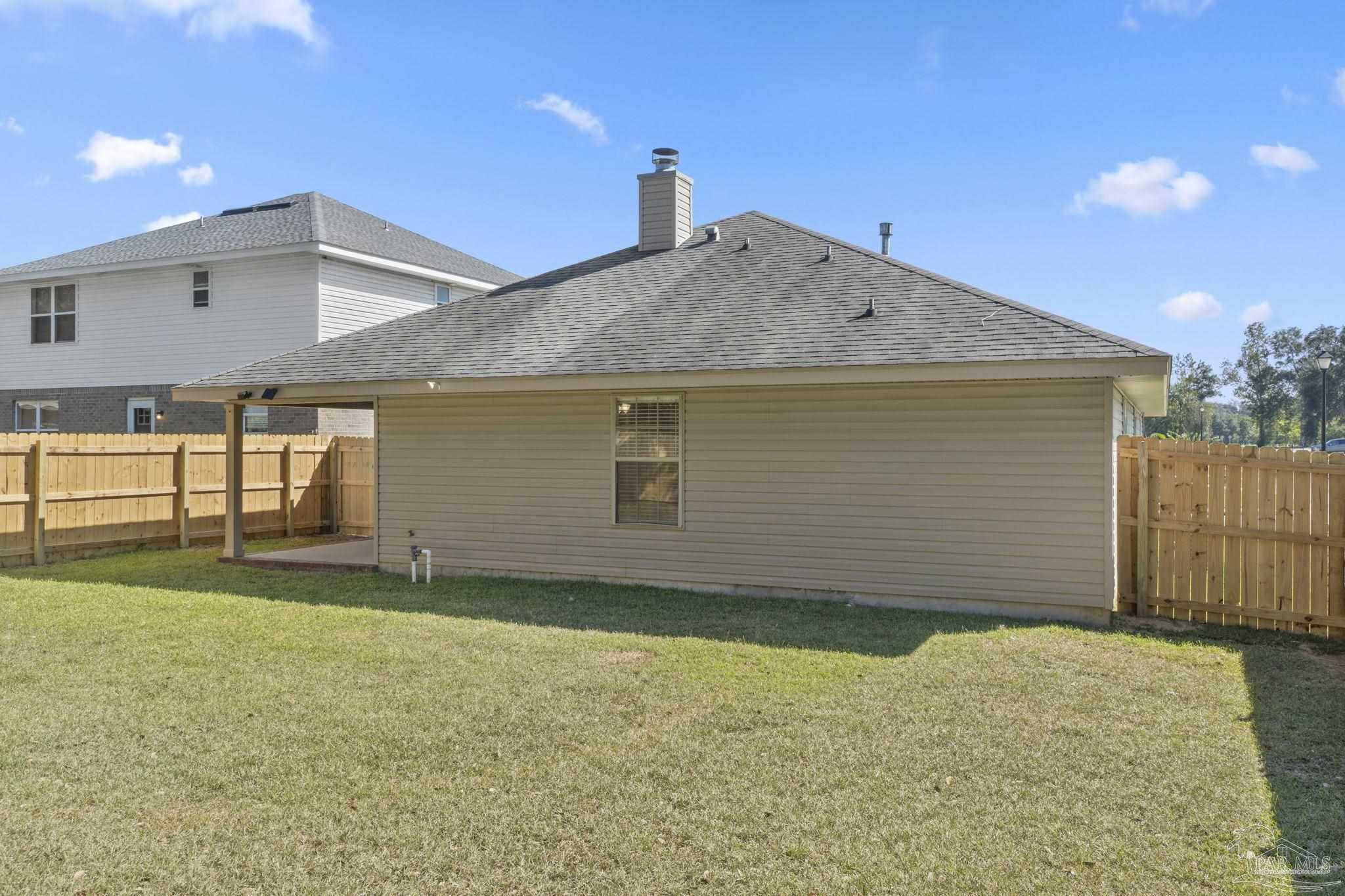 576 Edith Lane Pensacola, FL 32534 - Photo 37 of 38 a backyard of a house