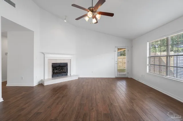 a kitchen with stainless steel appliances granite countertop a stove a sink and a granite counter tops