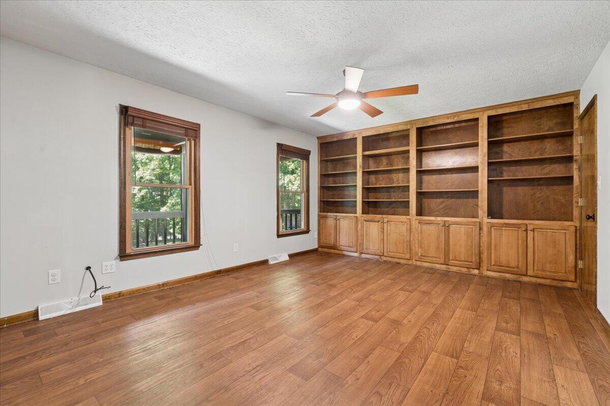 431 Langdon Road Evington, VA 24550 - Photo 13 of 54 a view of an empty room with a window and wooden floor