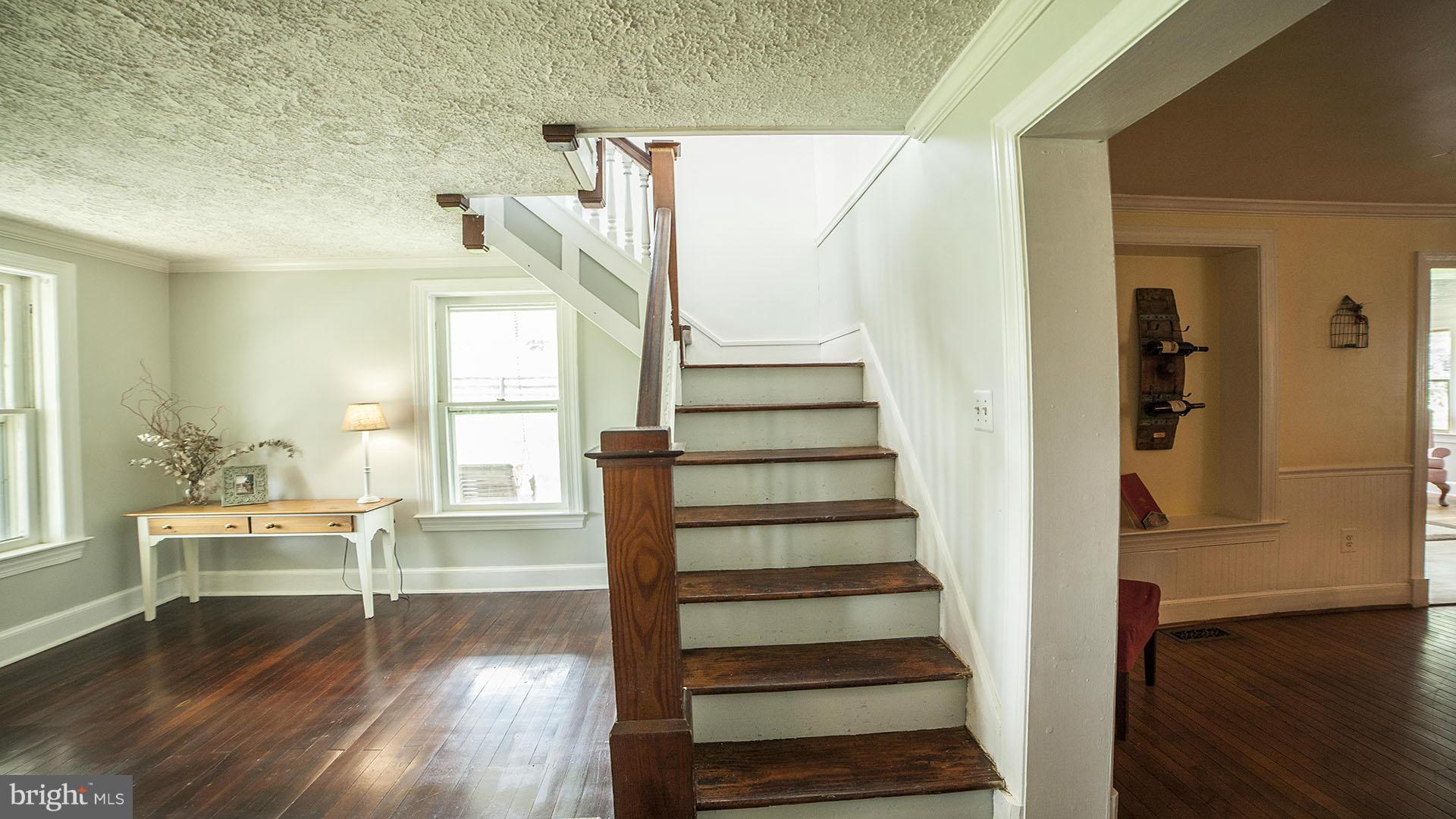 28901 Kemptown Road Mount Airy, MD 21771 - Photo 19 of 29 a view of entryway and hall with wooden floor