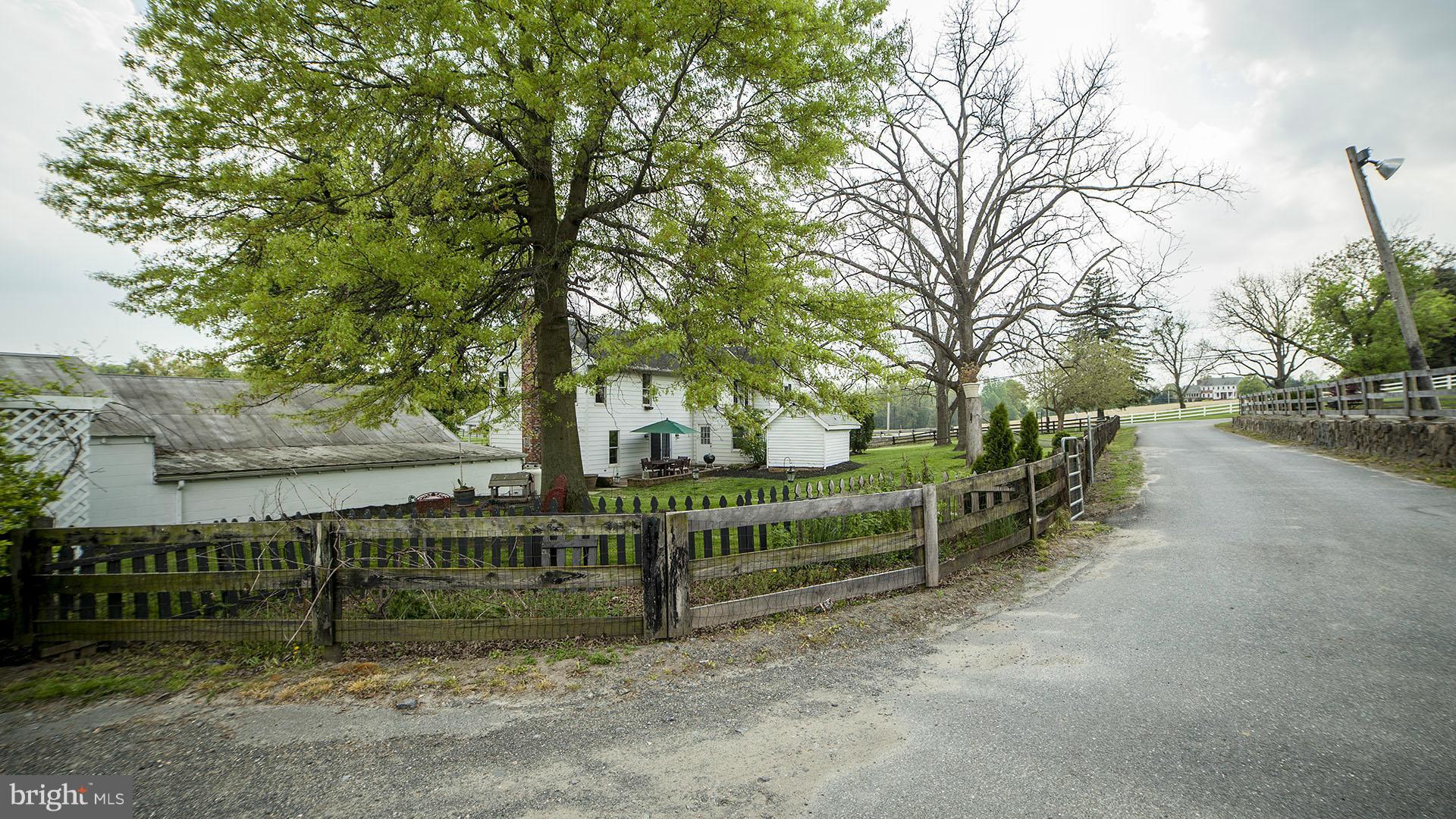 28901 Kemptown Road Mount Airy, MD 21771 - Photo 26 of 29 a view of street with wooden fence