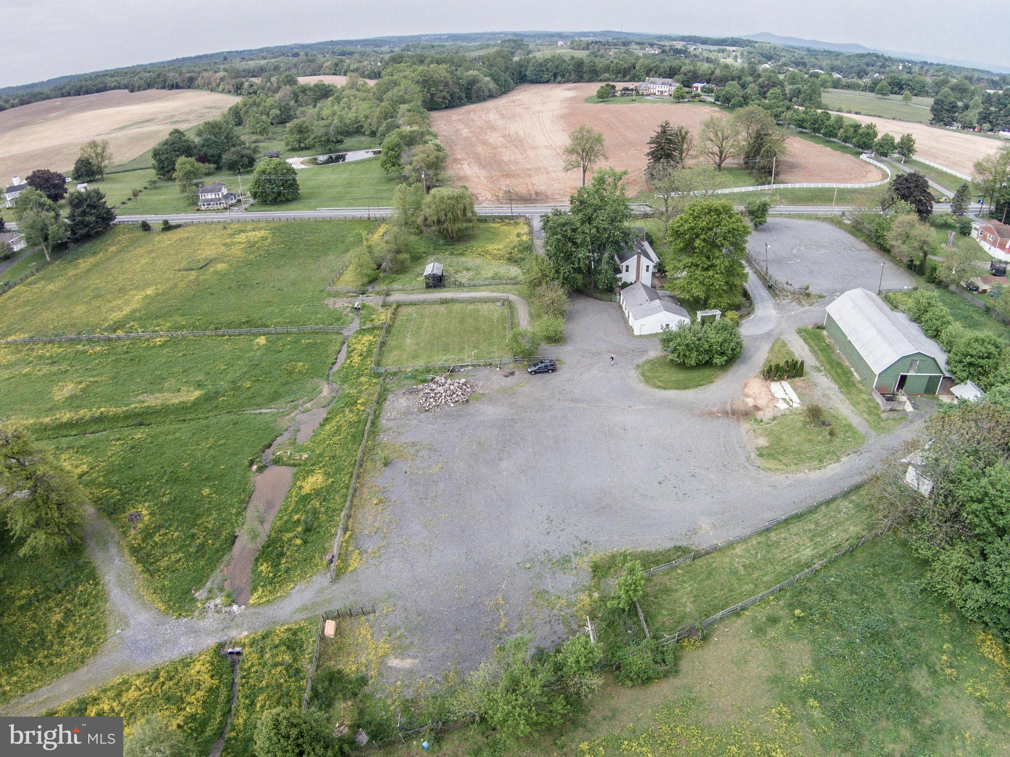 28901 Kemptown Road Mount Airy, MD 21771 - Photo 27 of 29 an aerial view of a house with outdoor space and a lake view