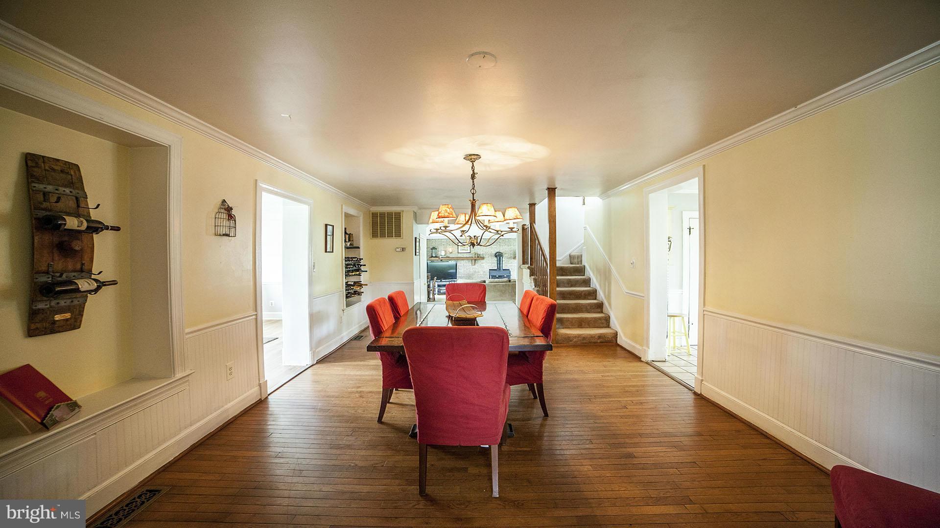 28901 Kemptown Road Mount Airy, MD 21771 - Photo 7 of 29 a view of a dining room with furniture window and wooden floor