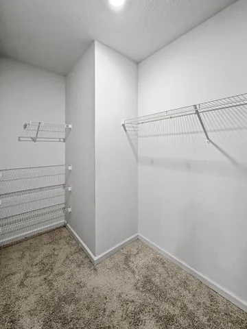 a view of a room with racks on the wall