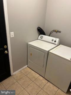 5644 Appletree Street Philadelphia, PA 19139 - Photo 10 of 12 a utility room with dryer and washer