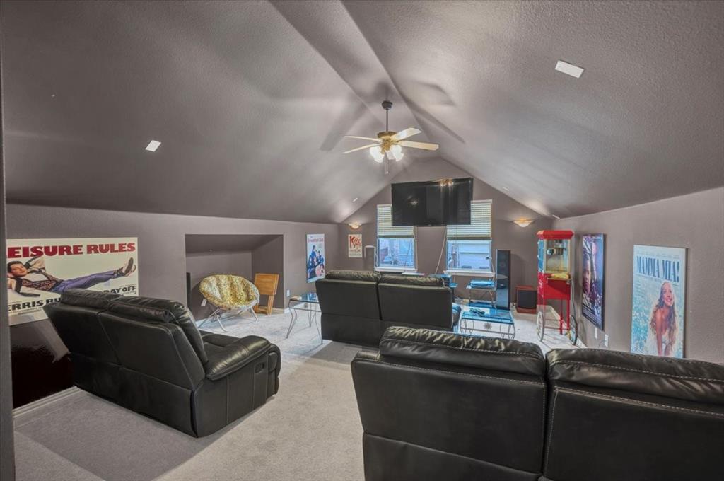 2015 Midhurst Drive Allen, TX 75013 - Photo 23 of 37 a living room with furniture and a wooden floor