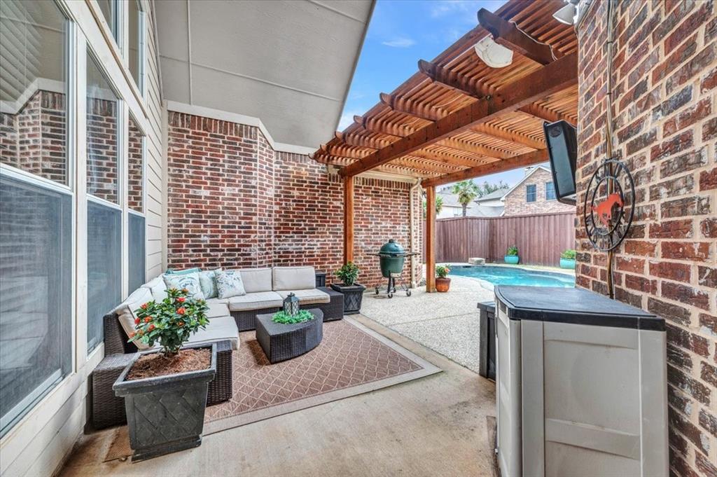 2015 Midhurst Drive Allen, TX 75013 - Photo 31 of 37 a building outdoor space with patio furniture and potted plants